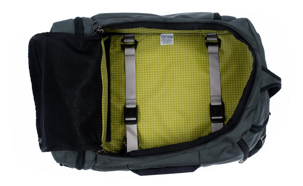 An open Techonaut 30 with a Steel (grey) Ballistic exterior and a Wasabi interior.